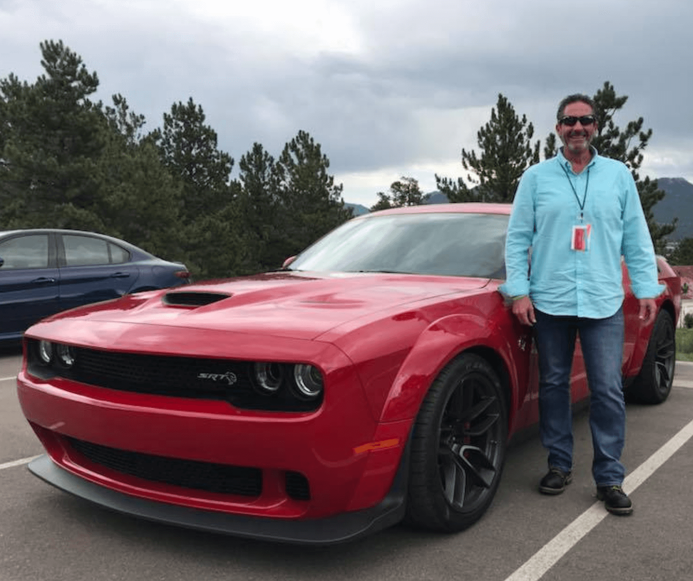 John and red car